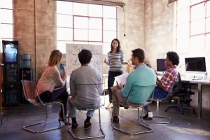 A moderator leading a focus group