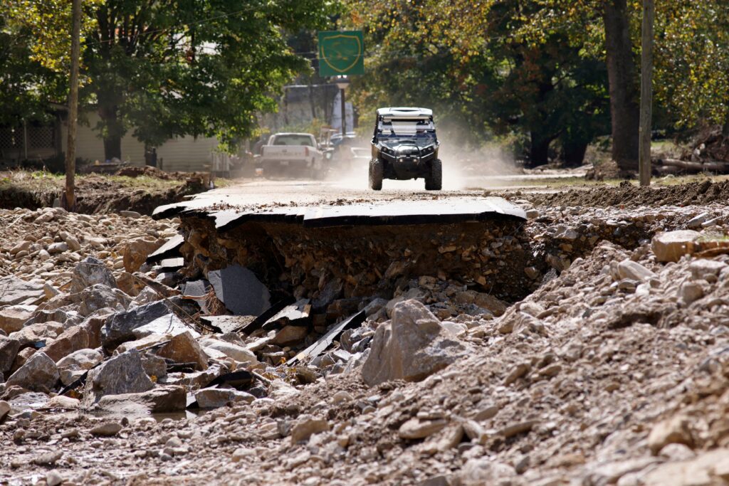 Flooded streets, destroyed homes, and debris mark the devastation in North Carolina following Hurricane Helene's destructive impact.